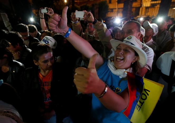 Supporters of "No" vote celebrate after the nation voted "No" in a referendum on a peace deal between the government and Revolutionary Armed Forces of Colombia (FARC) rebels, in Bogota, Colombia, October 2, 2016. REUTERS/John Vizcaino
